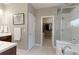 Main bathroom features a double vanity, a walk-in closet, and a separate shower at 13713 Raritan Ln, Broomfield, CO 80023