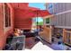 Cozy covered patio featuring a seating area, umbrella, and lovely decor for relaxing outdoors at 13713 Raritan Ln, Broomfield, CO 80023