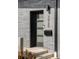 Modern front door, featuring a sleek design, house numbers, and a black mailbox at 3927 N Cook St, Denver, CO 80205