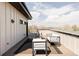 Inviting roof deck with comfortable seating and stylish outdoor rug at 3927 N Cook St, Denver, CO 80205