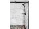 Modern shower with marble tile, a glass door, and black shower head at 3927 N Cook St, Denver, CO 80205