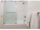 Well-lit bathroom with a glass shower door and white subway tile at 6396 Twin Lakes Rd, Boulder, CO 80301
