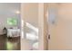 Bathroom showing the shower with glass doors with a view into the bedroom at 6396 Twin Lakes Rd, Boulder, CO 80301