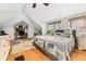 Main bedroom featuring a ceiling fan, a desk area and natural light at 2253 N Williams St, Denver, CO 80205