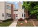 Charming two-story townhouse with brick accents and a well-maintained front yard at 8126 Gray Ct # 499, Arvada, CO 80003