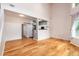 Bright living room featuring hardwood floors, and access to the kitchen at 8126 Gray Ct # 499, Arvada, CO 80003