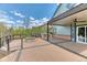 Beautiful backyard deck with a built-in fire pit, grill, and a covered patio area at 16652 W Archer Ave, Golden, CO 80401