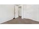 Bedroom featuring neutral carpet and white doors at 1175 Xanthia, Denver, CO 80220