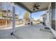 Covered patio with plenty of space, ceiling fan, and comfortable seating area at 7961 E 131St Ave, Thornton, CO 80602