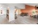 Bright and airy living area showcasing modern decor, wood-look floors, and an open floor plan at 9563 Milwaukee Ct, Thornton, CO 80229