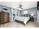 Bright bedroom with hardwood floors and ceiling fan at 3346 S Quintero St, Aurora, CO 80013