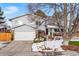 Two-story home with attached garage, landscaping, and a spacious front yard at 3346 S Quintero St, Aurora, CO 80013