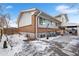 House exterior with snowy yard and walkway at 3346 S Quintero St, Aurora, CO 80013