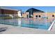 Outdoor swimming pool with lap lanes and clear water in a recreational area at 9980 W Jewell Ave # B, Lakewood, CO 80232