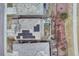 Aerial view of home with solar panels, backyard, deck, patio with outdoor seating and surrounding landscape at 10104 Nadine Ave, Parker, CO 80134