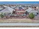 Aerial view of home showcasing the backyard, deck, hot tub, patio with outdoor seating, garden beds and landscaping at 10104 Nadine Ave, Parker, CO 80134