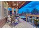 Relaxing back deck with dining area, hot tub, and outdoor living space at 10104 Nadine Ave, Parker, CO 80134