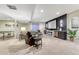 Finished basement featuring a home theater setup, fireplace, and comfortable seating area at 10104 Nadine Ave, Parker, CO 80134