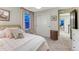 Pretty pink bedroom with carpet floors and double-door closet at 10104 Nadine Ave, Parker, CO 80134
