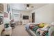 Cozy bedroom with a queen bed, built-in desk, and plenty of closet space at 803 William Way, Brighton, CO 80603