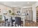 Modern kitchen with granite countertops and island at 803 William Way, Brighton, CO 80603