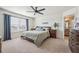 Main bedroom with ensuite bathroom and walk-in closet at 803 William Way, Brighton, CO 80603