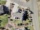 An aerial view shows a house and its surroundings in a neighborhood that features a well-maintained yard at 16791 W 48Th Ln, Golden, CO 80403