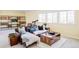 Inviting living room with leather sofa, telescope and wooden accents at 16791 W 48Th Ln, Golden, CO 80403