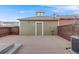 Backyard composite deck featuring a door that leads inside and is perfect for outdoor entertaining at 22813 E Briarwood Pl, Aurora, CO 80016
