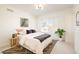 Cozy bedroom with a comfortable bed and plenty of light at 4222 Stuart St, Denver, CO 80212