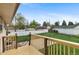 Backyard with grass, white fence, and detached garage at 1549 Dean Dr, Northglenn, CO 80233