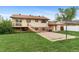 Backyard with deck and basketball court at 1549 Dean Dr, Northglenn, CO 80233