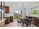 A dining area that has sliding glass doors to backyard access and outdoor enjoyment at 1549 Dean Dr, Northglenn, CO 80233