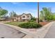 Charming two-story home with a well-manicured lawn and mature trees on a corner lot at 1549 Dean Dr, Northglenn, CO 80233