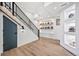 Finished basement features a staircase, sports decor, and light wood floors at 10757 Timberdash Ave, Highlands Ranch, CO 80126