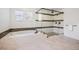 Modern bathroom with a tub, glass shower, and sleek marble tile at 10757 Timberdash Ave, Highlands Ranch, CO 80126