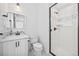 Modern bathroom with a glass-enclosed shower, stylish vanity, and sleek fixtures at 10757 Timberdash Ave, Highlands Ranch, CO 80126