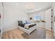 Bedroom featuring a bed, a dinosaur decoration, and a large window at 10757 Timberdash Ave, Highlands Ranch, CO 80126