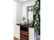Modern kitchen with wine cooler and stylish countertops at 1330 Olive St, Denver, CO 80220