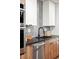 Close-up of a modern kitchen with a black sink and faucet at 1330 Olive St, Denver, CO 80220