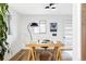 Bright office space featuring a minimalist desk, modern lighting, and neutral color palette at 1330 Olive St, Denver, CO 80220