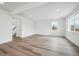Spacious basement featuring sleek hardwood flooring and natural light at 24790 E 39Th Ave, Aurora, CO 80019