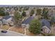 Gorgeous aerial view of several homes nestled in a well-maintained, tree-filled suburban neighborhood at 1011 S Valentia St # 3, Denver, CO 80247