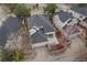 Aerial view of homes with fenced-in yards and manicured landscaping, complete with a concrete patio at 1011 S Valentia St # 3, Denver, CO 80247