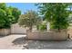 Charming home exterior with a spacious driveway and attached garage at 1011 S Valentia St # 3, Denver, CO 80247