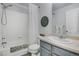 Bathroom featuring a shower, sink, cabinet and decor at 9080 Gale Blvd # 4, Thornton, CO 80260