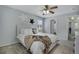 Cozy bedroom features neutral walls, carpet, and a nicely decorated bed at 9080 Gale Blvd # 4, Thornton, CO 80260