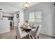 Charming dining area with seating for four, bathed in natural light at 9080 Gale Blvd # 4, Thornton, CO 80260