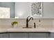 Kitchen sink area featuring decor, faucet, and soap dispenser at 9080 Gale Blvd # 4, Thornton, CO 80260
