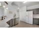 Efficient kitchen layout with modern appliances, ample storage, and easy access to the dining area at 9080 Gale Blvd # 4, Thornton, CO 80260